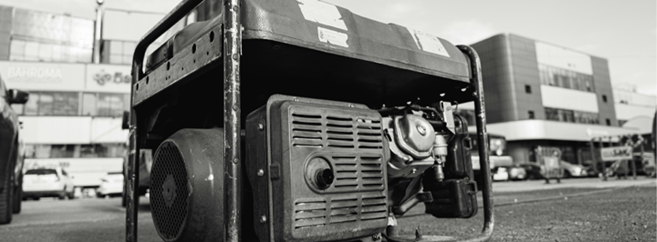 Portable generator sitting in a carpark