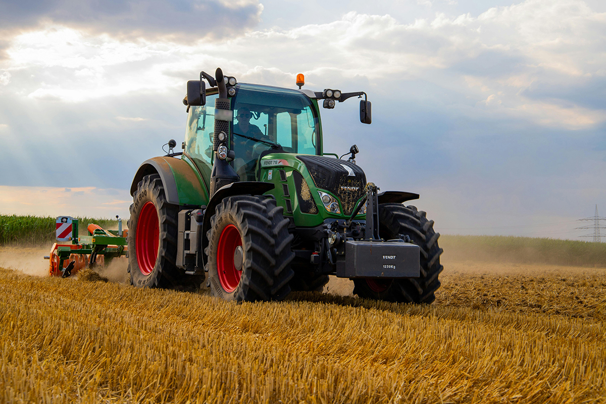 tractor harvesting hay